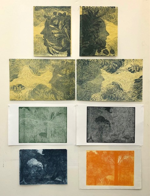 prints for artists book on studio wall